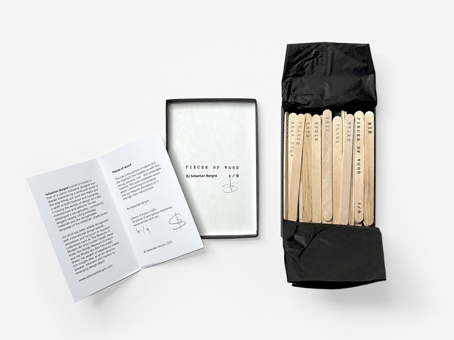 Artwork comprising of printed wooden sticks by Sebastian Bergne